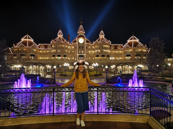 I&B's Founder posing in front of the Disneyland Hotel in Paris at night