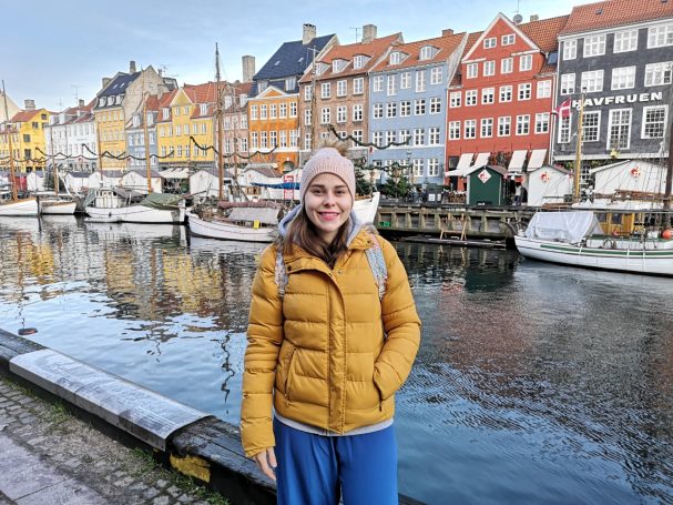 I&B's Founder posing opposite the colourful buildings of Nyhavn in Copenhagen