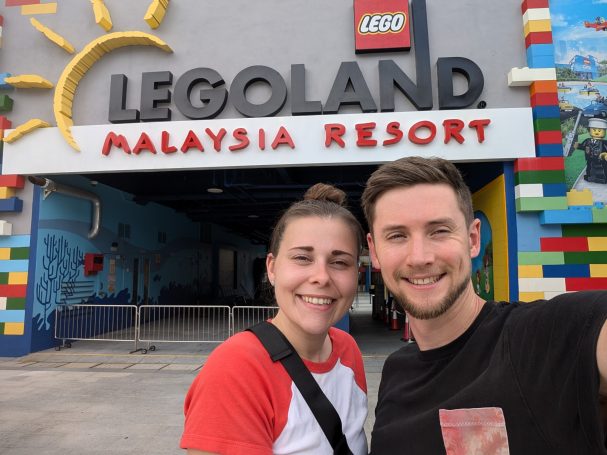 I&B's Founder and Husband posing in front of the Legoland Malaysia sign